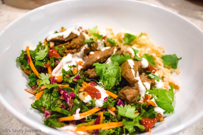 Bowl of steak, rice, and kale slaw