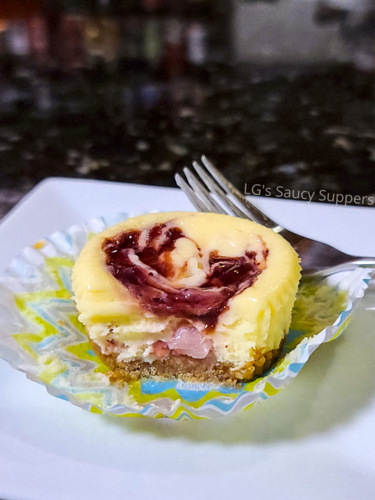 Image of individual strawberry cheesecake with fork